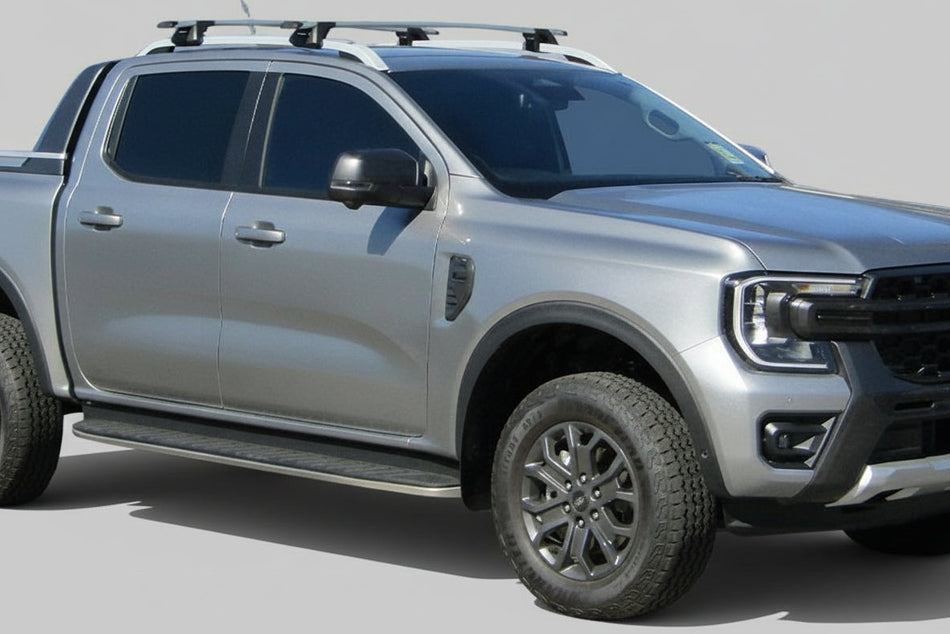 Prečni nosilci Yakima ThruBar za originalne vzdolžne nosilce za Ford Ranger Wildtrak, Platinum 2023+, VW Amarok 2023+